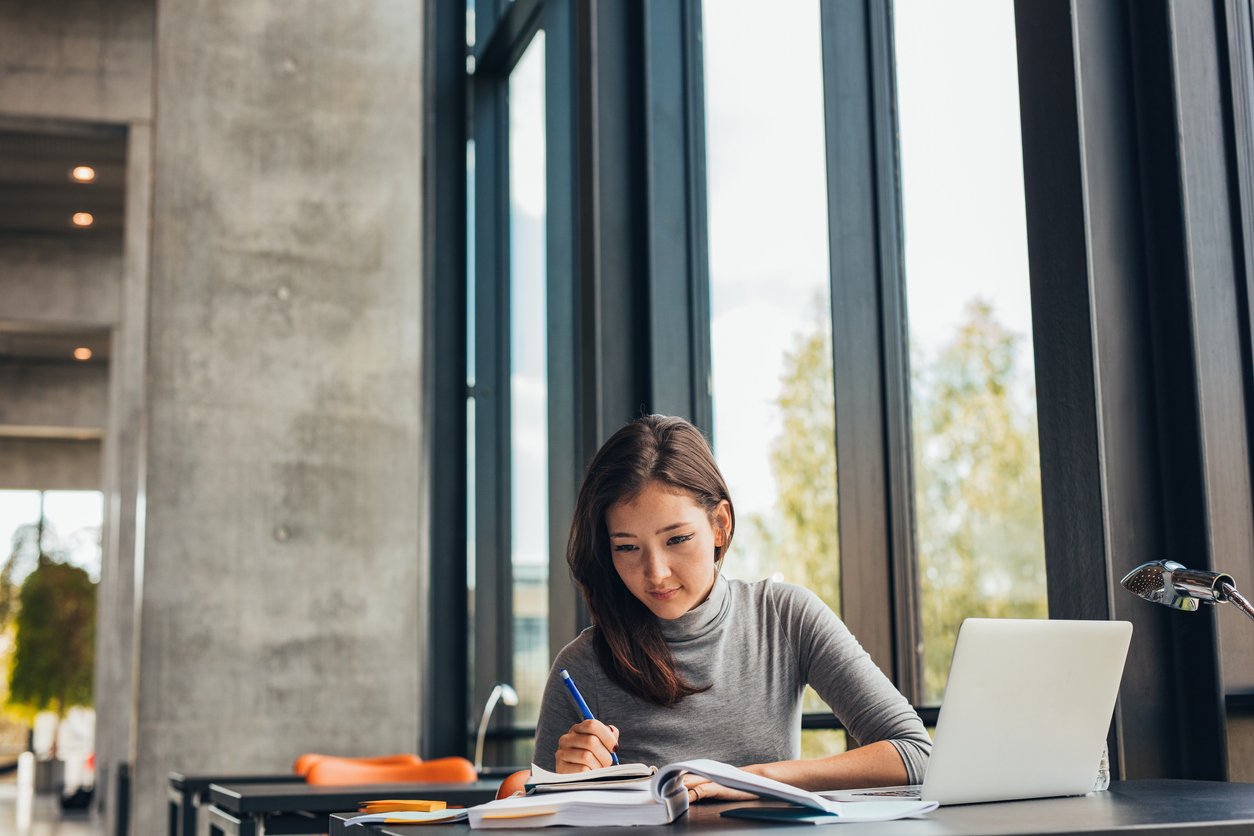 Young woman completing her law school application early