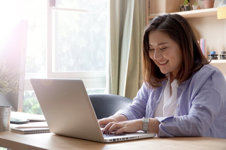 Woman adding an addendum to her law school application