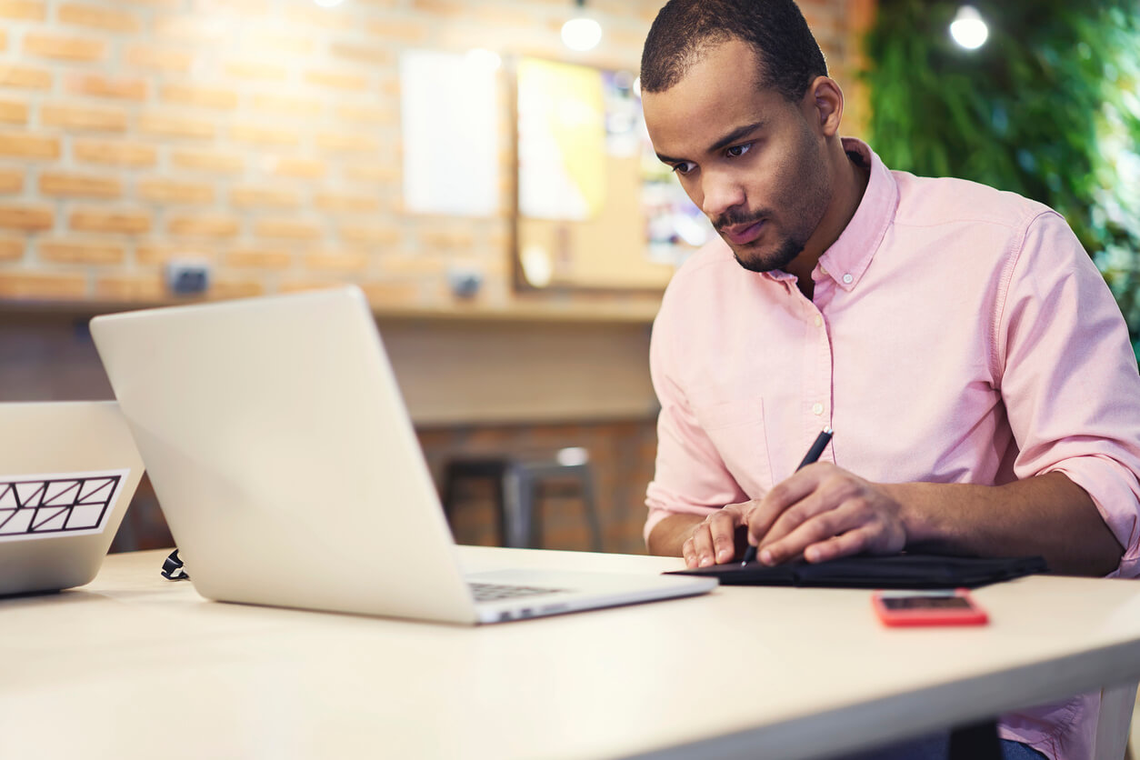 man working on laptop